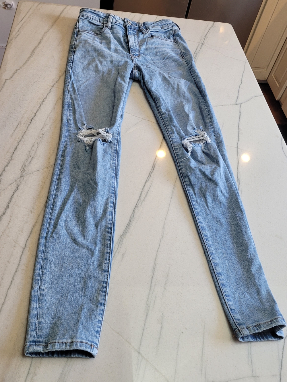 Women’s Light Blue Ripped Skinny Jeans